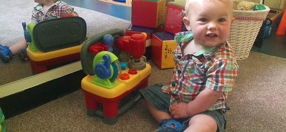 Baby playing with toys